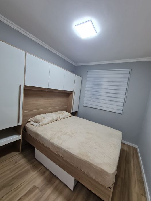 Quarto casal com arrumação
