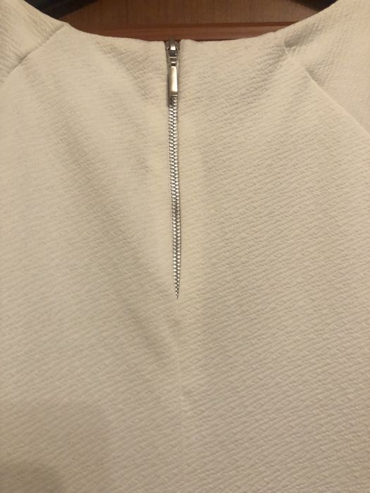 Biała elegancka sukienka