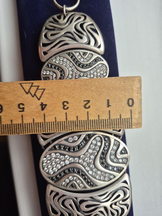 Срібний браслет з каміньцями