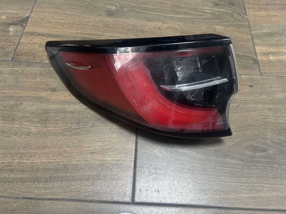 Lampa tylna lewa TOYOTA COROLLA E21 18-22 KOMBI ORG.
