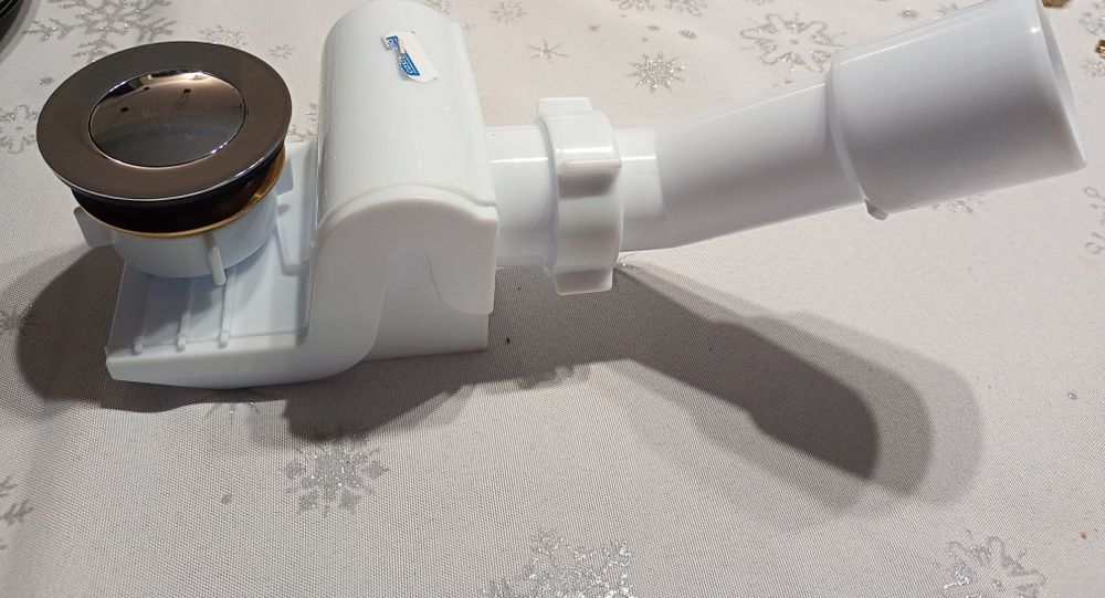 Syfon wannowy lub brodzikowy wraz z korkiem srebrnym