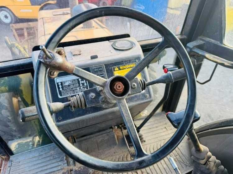 Екскаватор - навантажувач NEW HOLLAND (JCB 3CX)