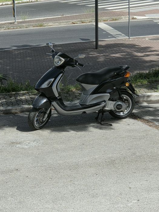 Piaggio fly 125 4 tempos muito económica