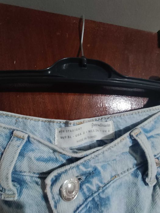 Calça de ganga larga clarinha