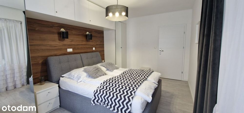 Przestronne mieszkanie z balkonem i garażem w apartamentowcu