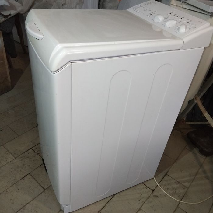 Вертикальная стиральная машина индезит.