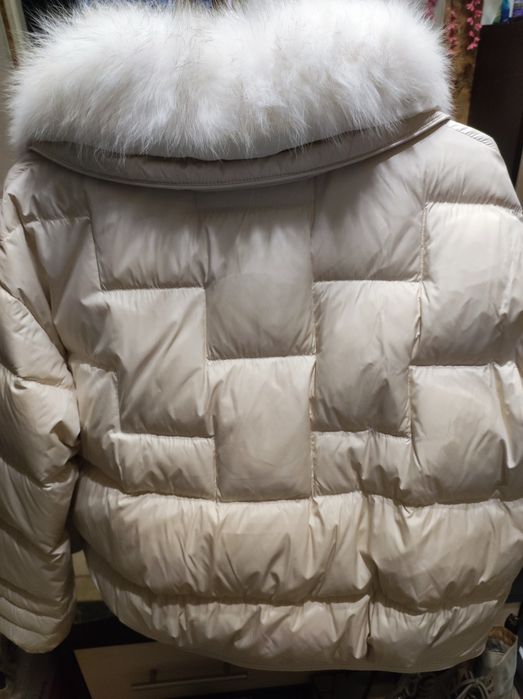 Жіноча пухова курточка