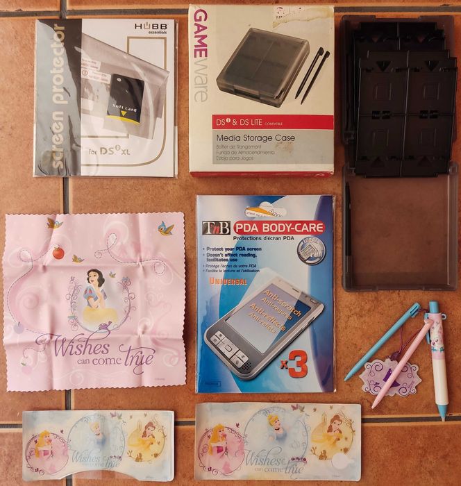 NINTENDO DS XL c/ acessórios e 9 jogos