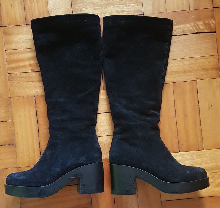 Botas pretas cano alto