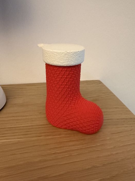Bota de Natal com labirinto para dinheiro