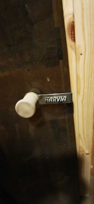 Szklane drzwi do sauny firmy Harvia z futryną