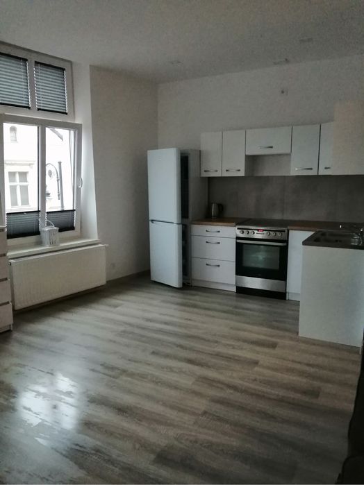 Inwestycyjna nieruchomość składająca sie z 3 mieszkań w centrum