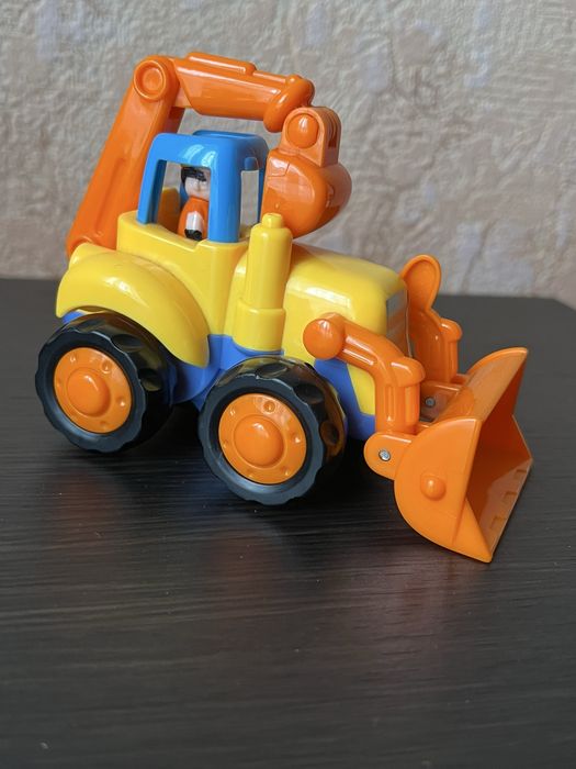 Синій трактор та вся колекція Hola