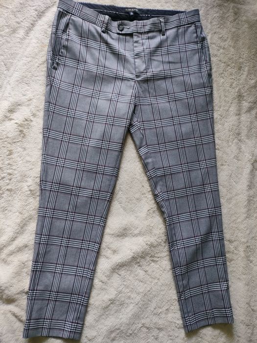 Spodnie river island 32/30 jak nowe