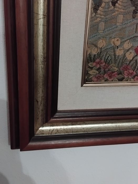 Tapeçaria com moldura