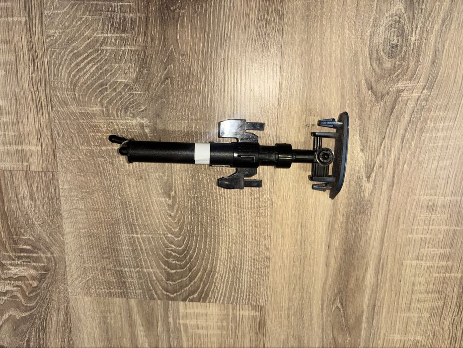 Форсунка омивача фари з кришкою передня ліва Volvo XC40 /32229278