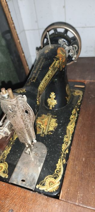 Máquina antiga costura Singer