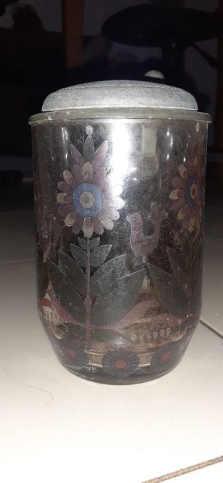 Caneca em vidro.