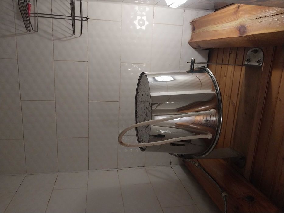 Дерев'яна баня зі зрубу розміром 5,6 м * 5,6 м