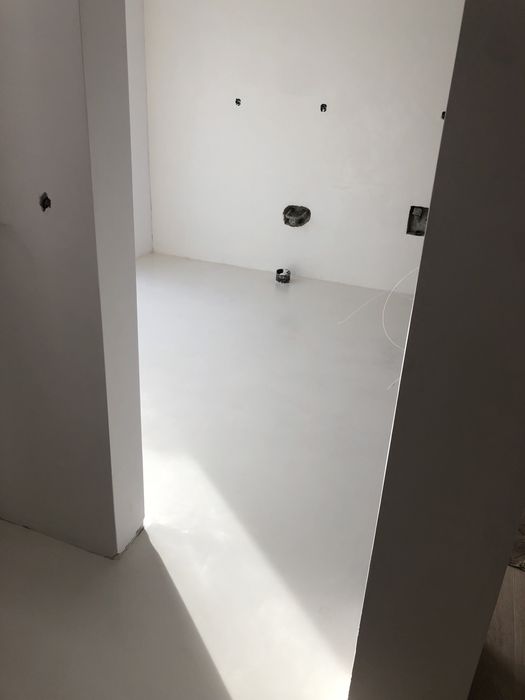 Aplicação de Microcimento,capoto,cortiça projetada e betao a vista