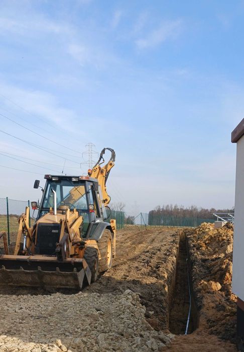 Koparko-ładowarka Usługi niwelacja terenu korytowanie wykopy przyłącza