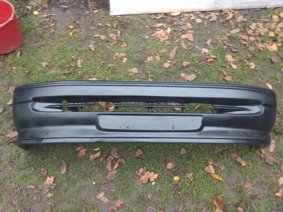 Передній бампер Форд Оріон