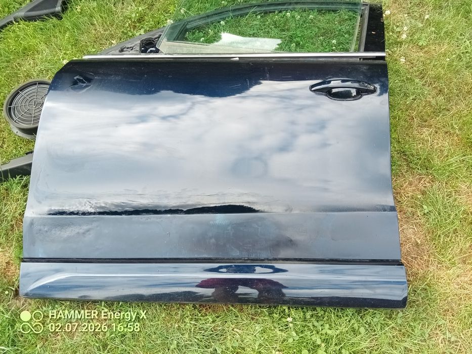 Drzwi Audi Q5  lewe błotnik