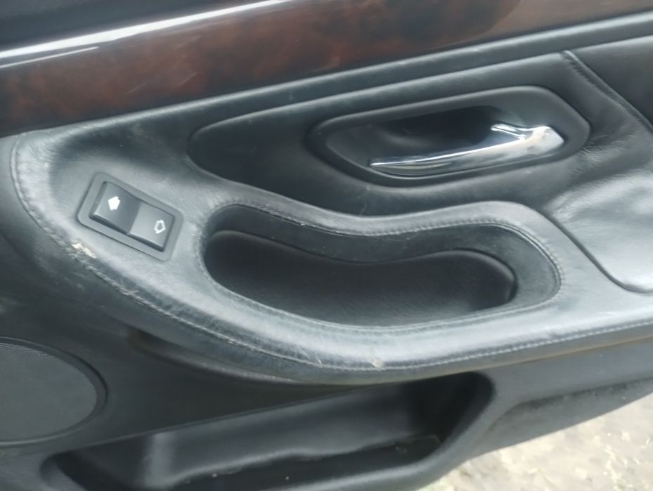 BMW e38 boczki drzwi skóra szyte rączki komplet