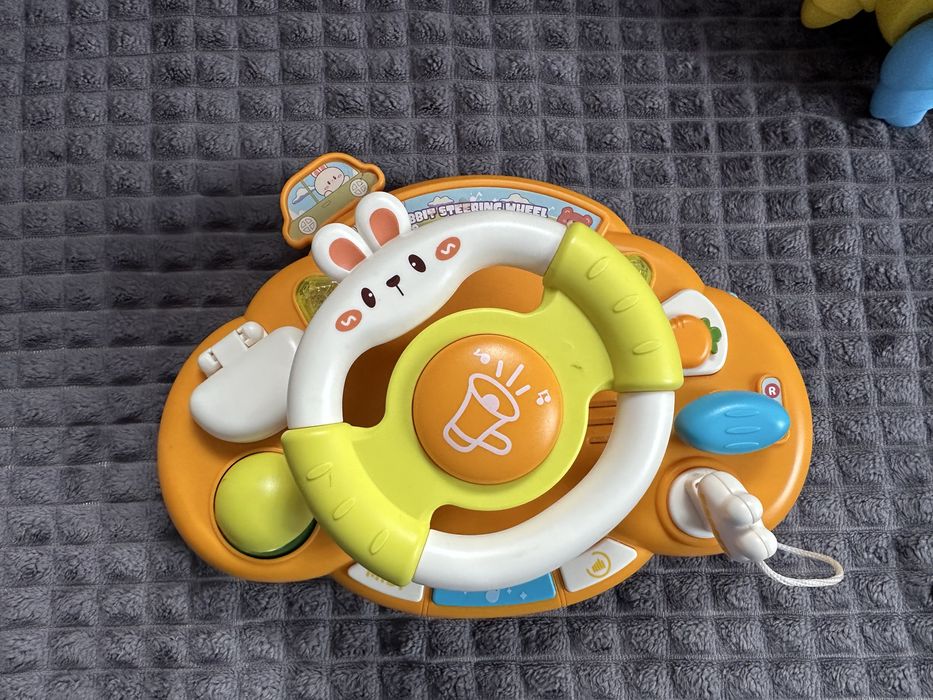 Музичний руль на коляску, танцюючий крабік, іграшки