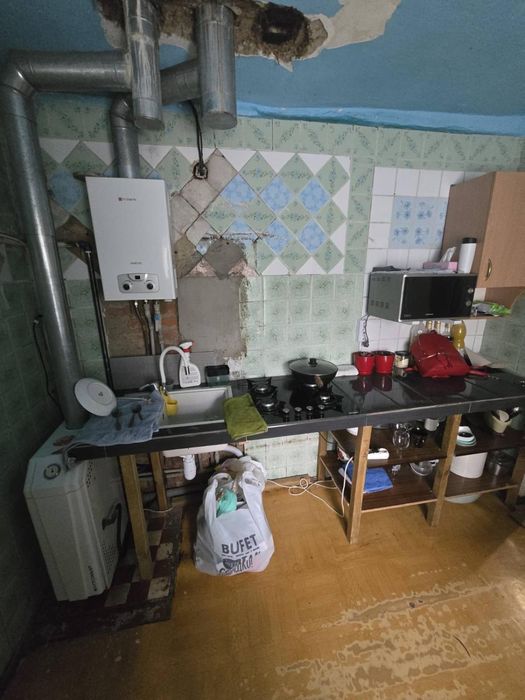 частина будинку з приватизованою ділянкою 7 соток. Роганський житловий