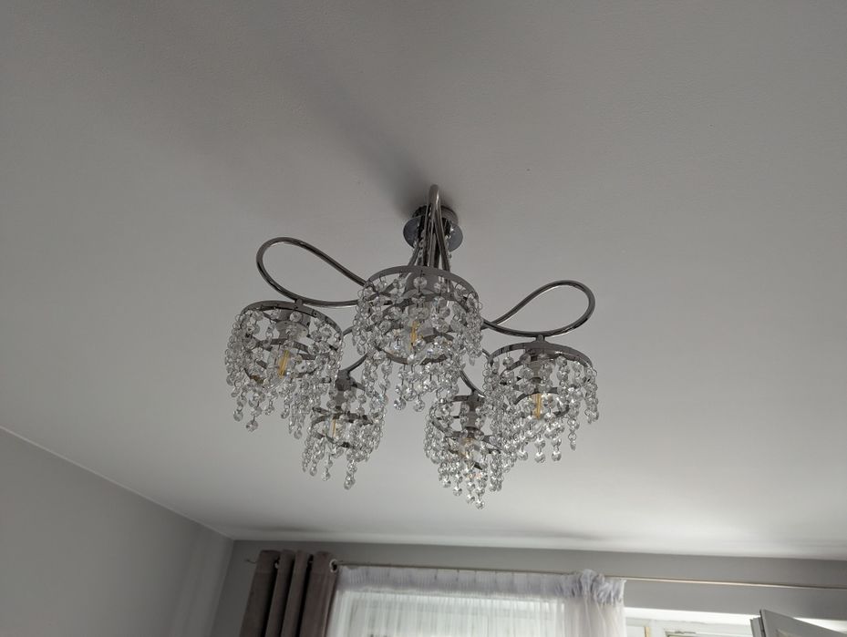 Żyrandol, kinkiet oraz zegar Glamour
