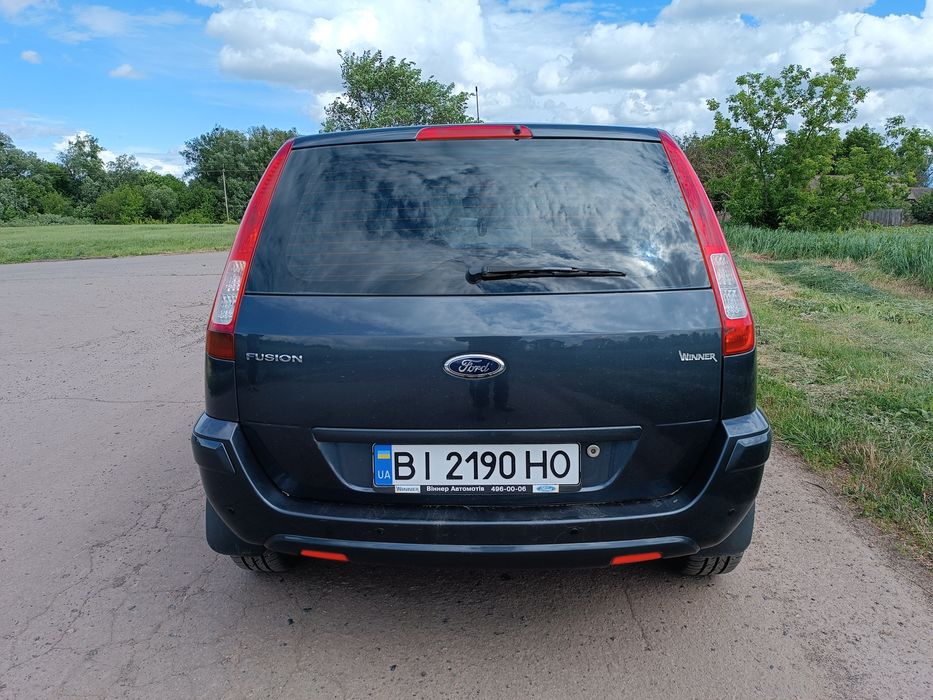 Ford Fusion 2010 VIN WF0UXXGAJUAM26402 фото оголошення 3 з 6