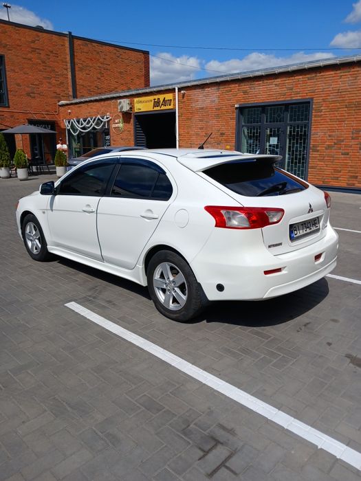 Mitsubishi Lancer 2009 VIN JMBLTCX3A9U002885 фото оголошення 2 з 18