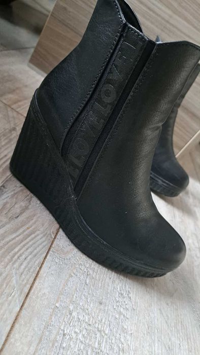 kozaki damskie na koturnie