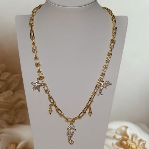 Naszyjnik z kolekcji Oceanique z morskimi zawieszkami, zdobione