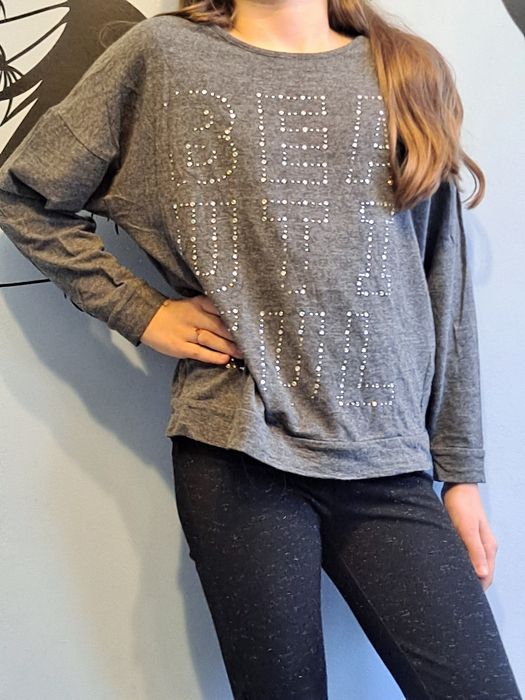 Spodnie czarne r. 134 srebrna nitka