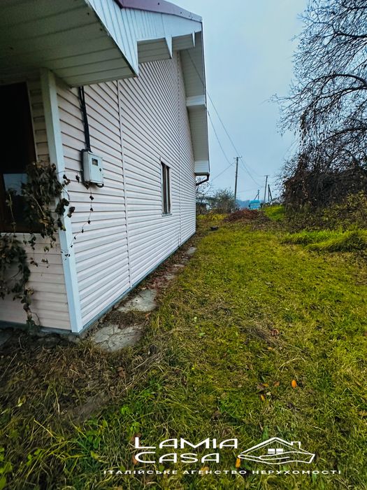 Продаж будиночка в Мигово з ділянкою