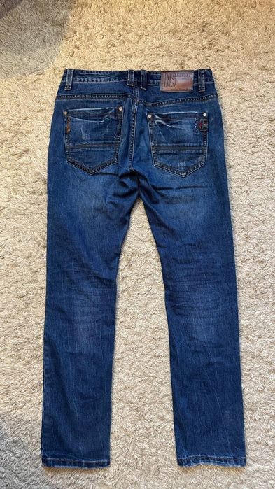 Джинси чоловічі синього кольору.