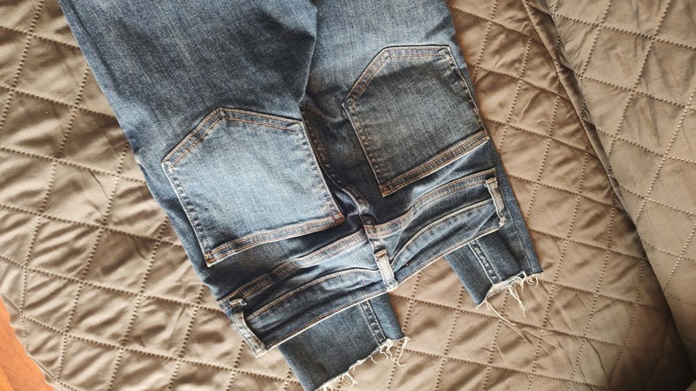 Spodnie z przetarciem DenimCo XS