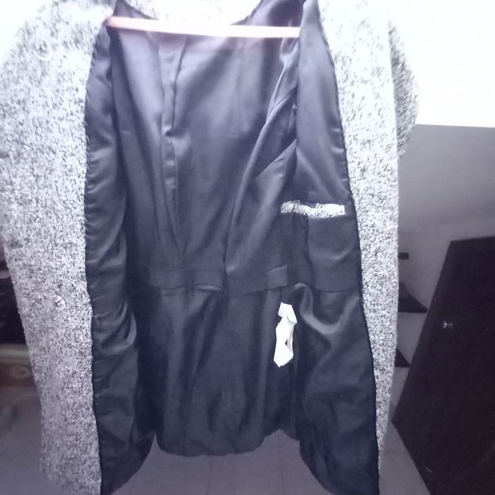 Casaco cinzento médio