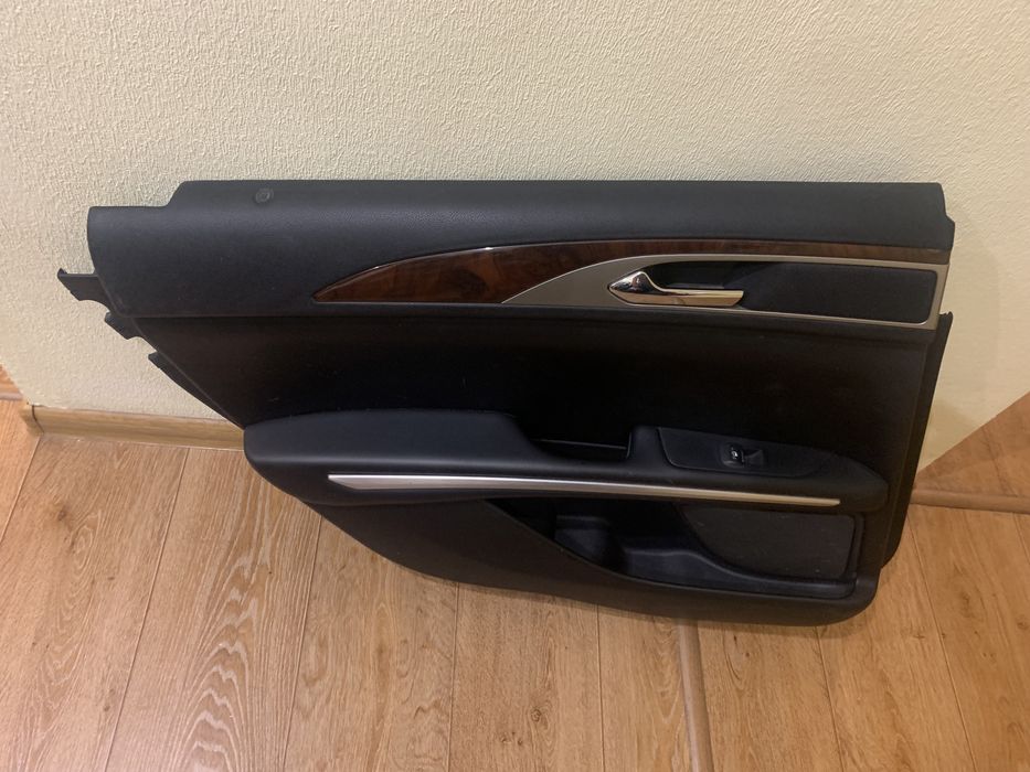 Обшивка двери карточка задняя левая Lincoln MKZ 13- черн