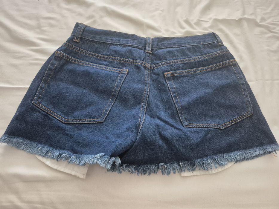 Calção ganga com rasgos