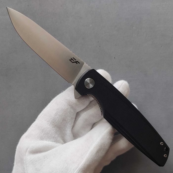 Ніж від фірми Eafengrow EF230. Лезо з D2.