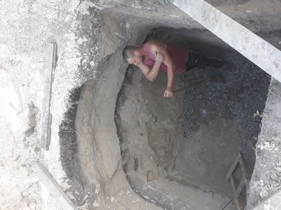 Сливная яма выгребная кольца