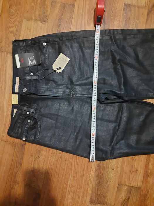 Женские джинсы levi's черные широкие клеш