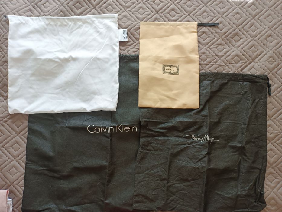 Пильники від одягу, взуття аксесуарів Louis Vuitton