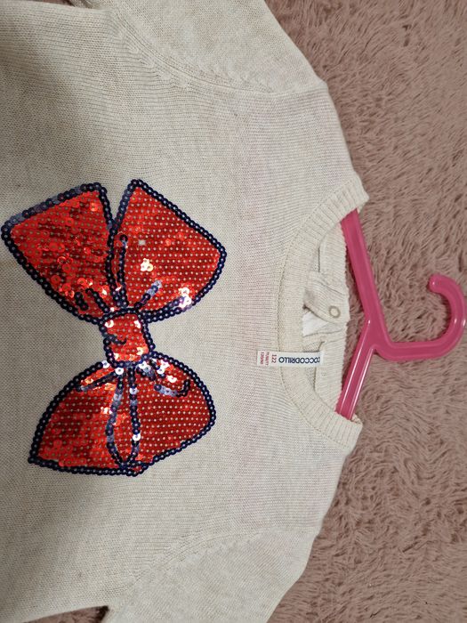 kremowy sweterek coccodrillo 122