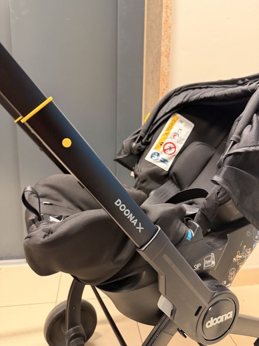 Doona X – fotelik samochodowy i wózek 2w1 + baza ISOFIX + akcesoria