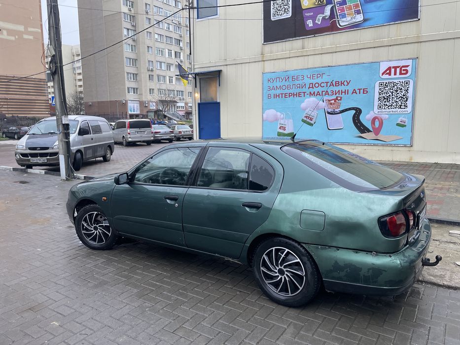Nissan Primera 1999 VIN SJNFEAP11U0393714 фото оголошення 4 з 8