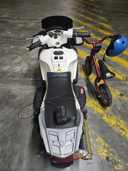 Mota e bicicleta para desocupar